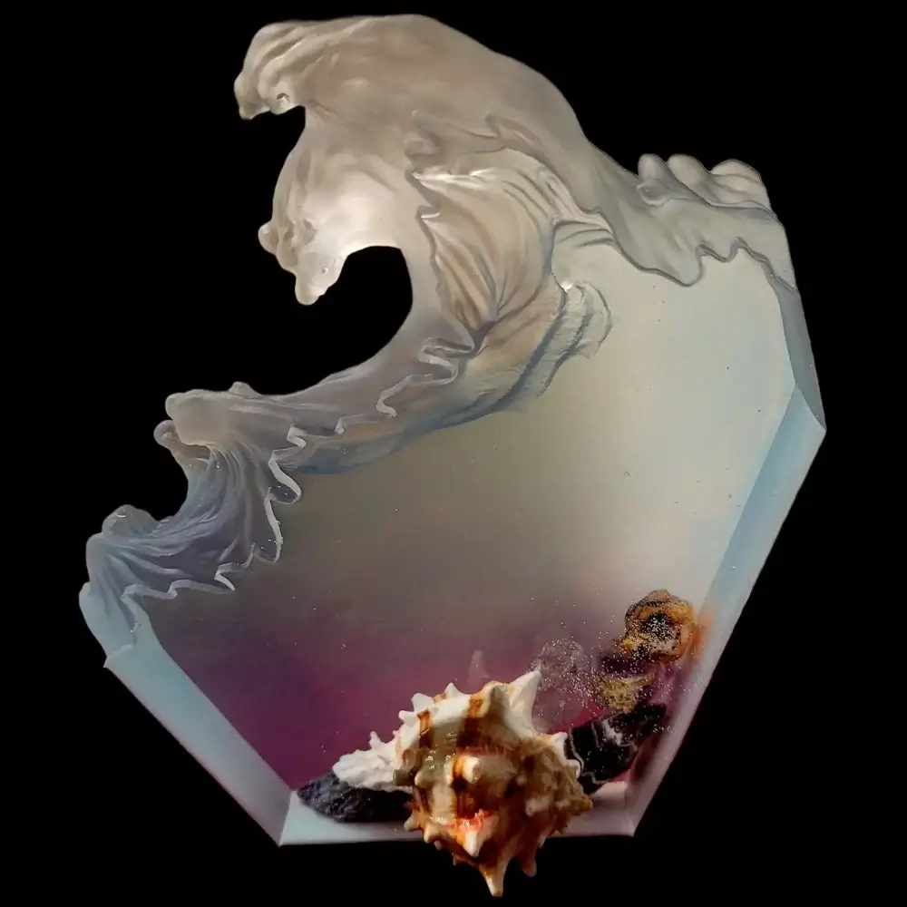 Ocean wave casted in clear resin with quartz rocks and a white and brown Mexican sea shell poking out