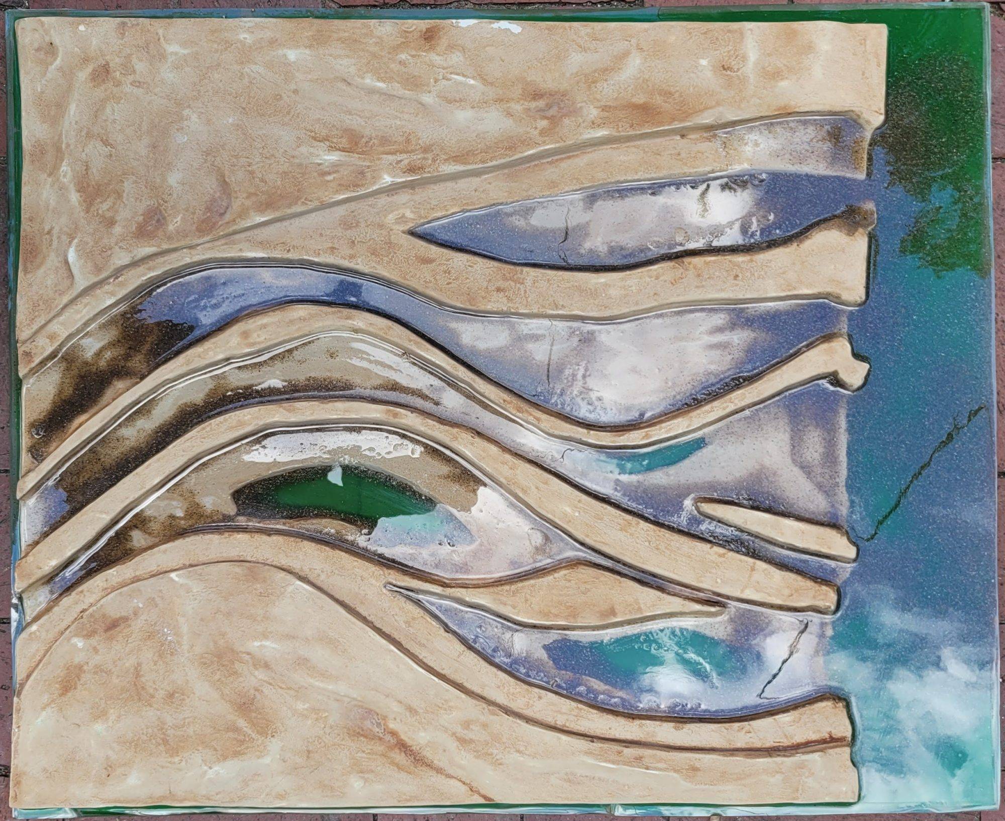 "Desert" topographic art showing desert soil eroding from floods, a sculpture made with plaster and resin. Watercolor was used to create shadows.