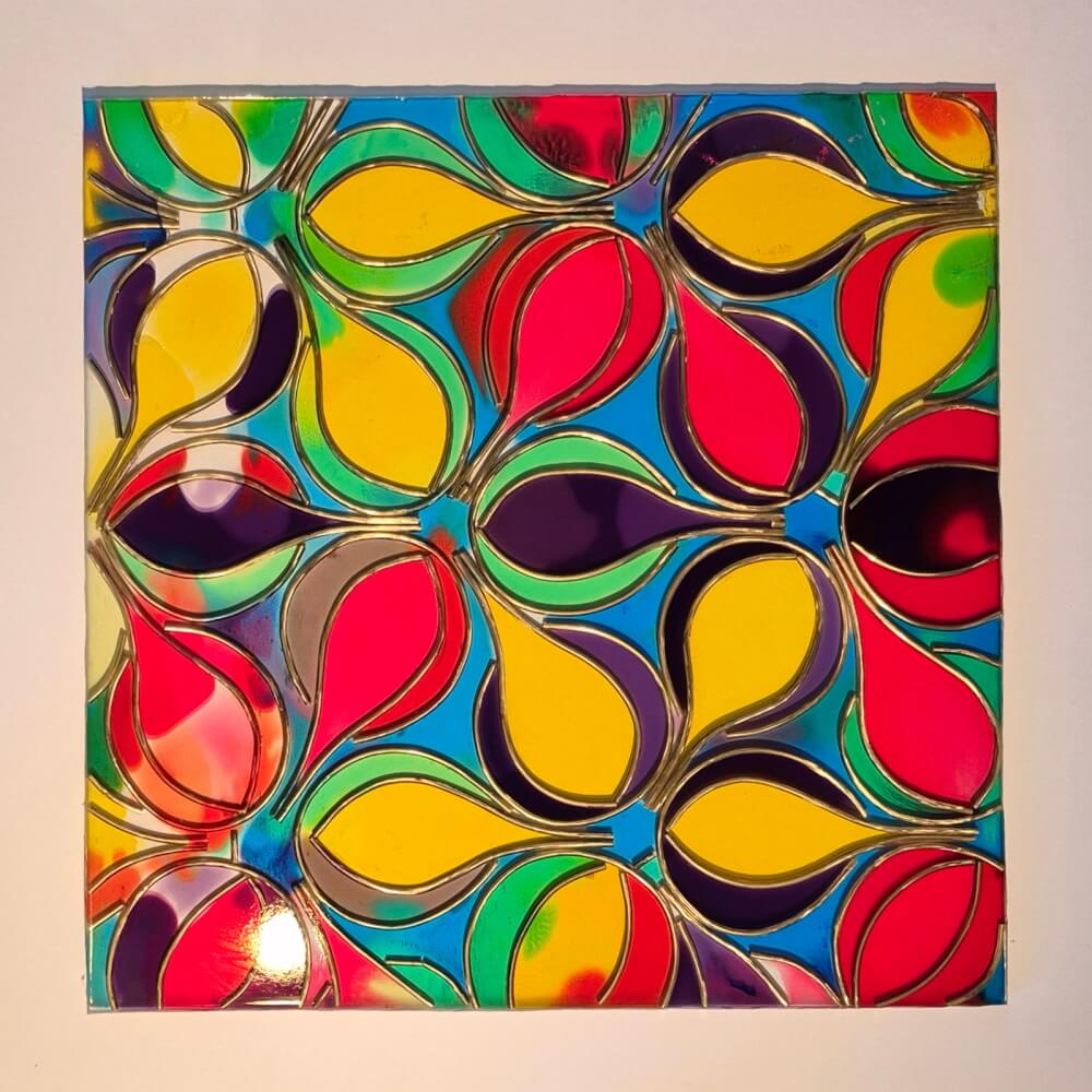 vertical view of hot air balloon resin art painting in bright colors of red, yellow, purple,and blue
